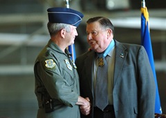 In good spirits MCCHORD AIR FORCE BASE, Wash.— Gen. Duncan McNabb, Air Mobility Command commander, congratulates Medal of Honor recipient, retired Col. Joe Jackson, during the naming of a McChord C-17 Globemaster III as the Spirit of Col. Joe M. Jackson recently. U.S. Air Force/Photo by Abner Guzman